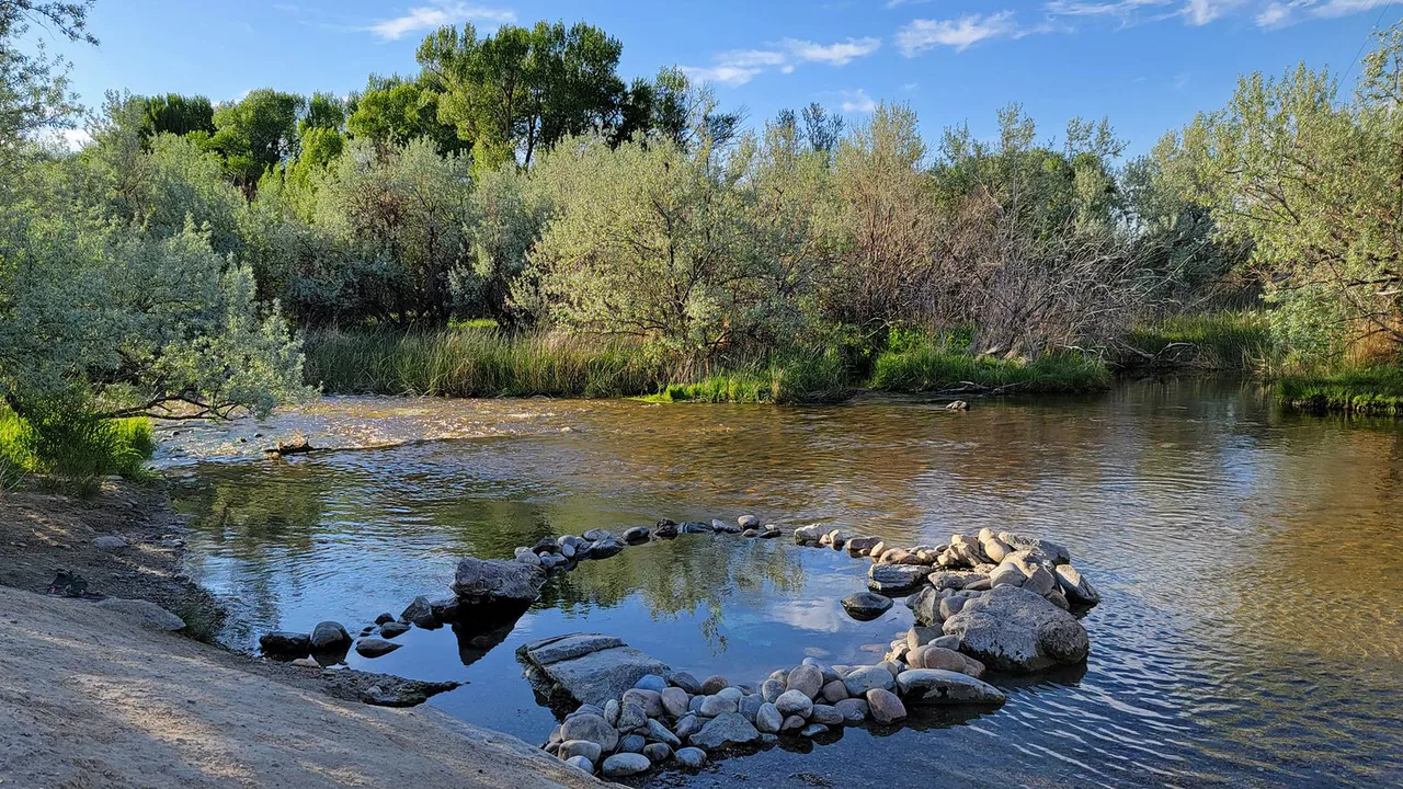 Hot spring pool in the river, Saratoga, WY